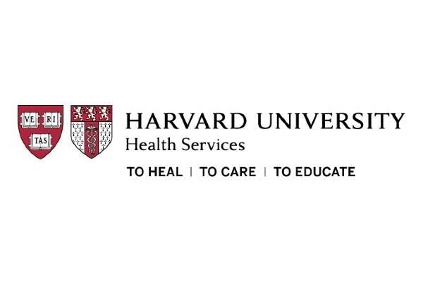 HUHS logo and shields with the words "to heal, to care, to educate"
