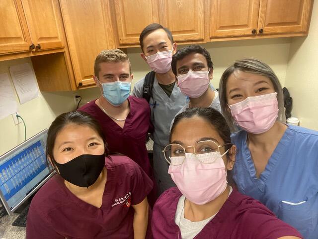 Ashiana Jivraj, DMD21, poses with fellow students in masks during clinical.