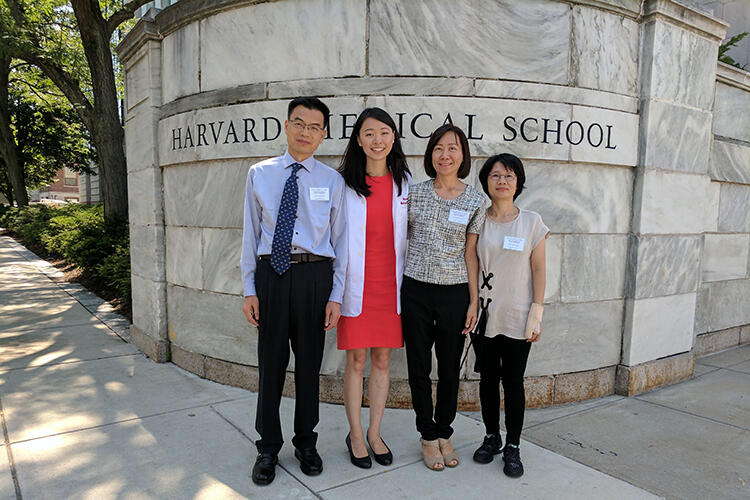 Laura Lin, DMD21, poses with her family at her White Coat Day at Harvard.