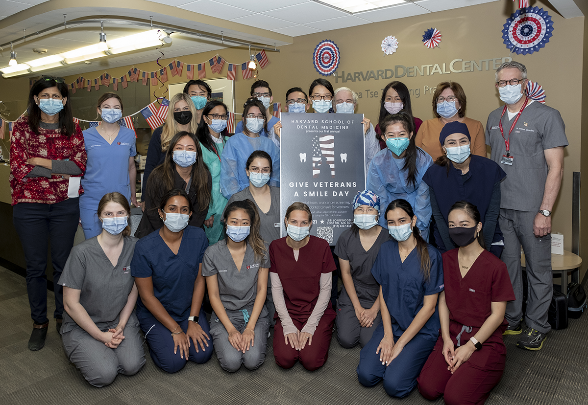 group of dental students and faculty at veterans event
