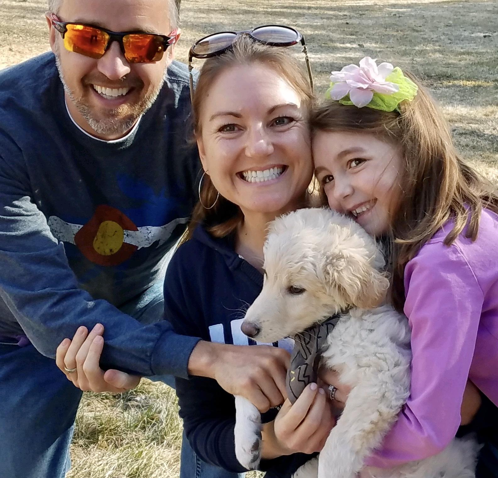 Dr. Brittany Seymour and her family spend time with their new dog amid the coronavirus outbreak.