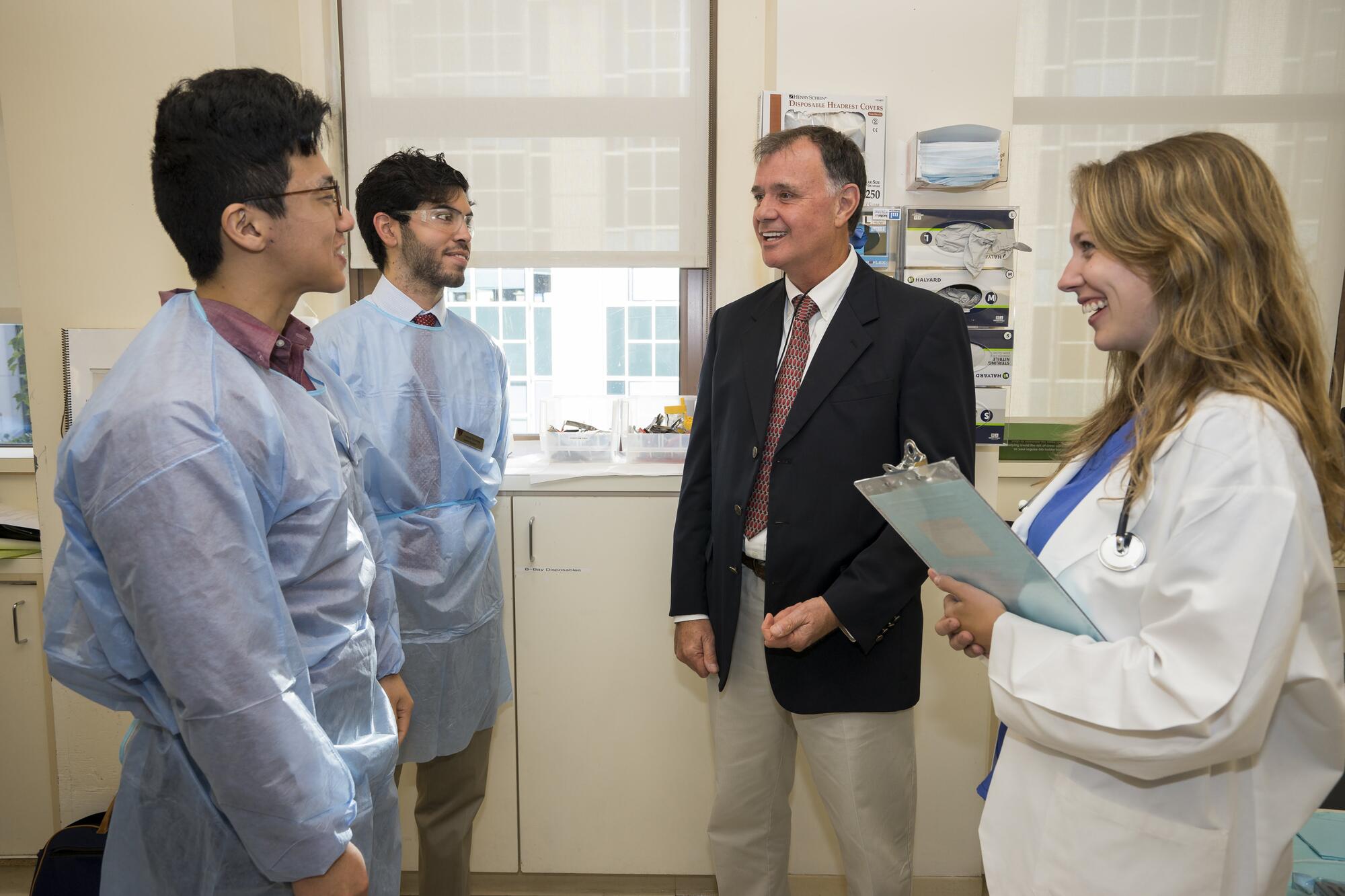 Dr. Len Brennan with students