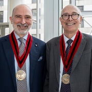 Drs. Maurizio Tonetti and Stephen Sonis with  Distinguished Alumni Awards