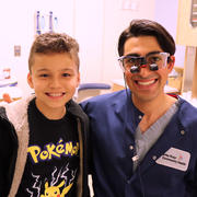 Student Ryan Lisann with patient Diego