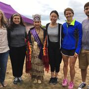 A group of HSDM students and faculty pose with a member of the Wampanoag Tribe while visiting Martha's Vineyard with the Wampanoag Outreach Group