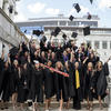Class of 2023 grads toss hats in the air