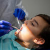 a young boy receiving dental care
